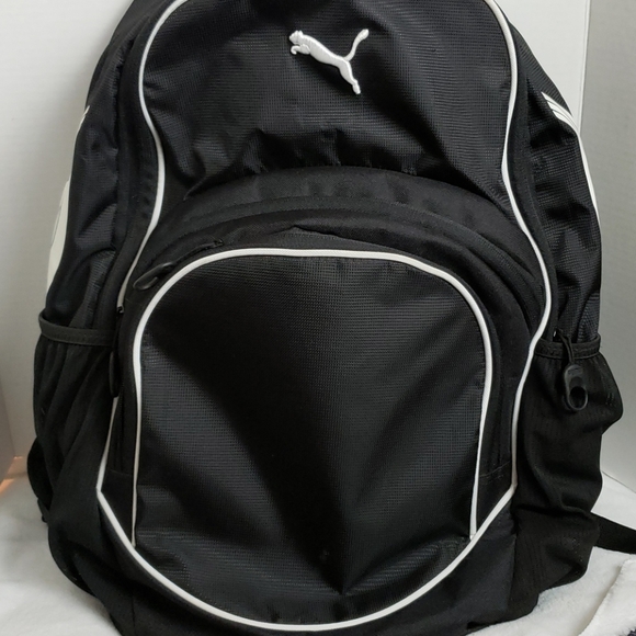 black and white puma backpack